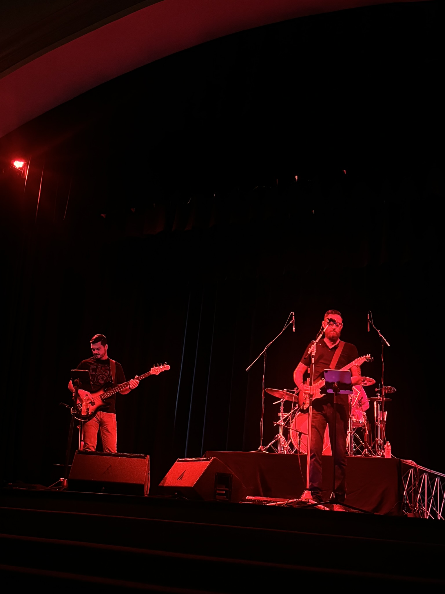 Live music under red stage lights